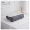 Atelier Cervical Support Pillow on white linen bedding